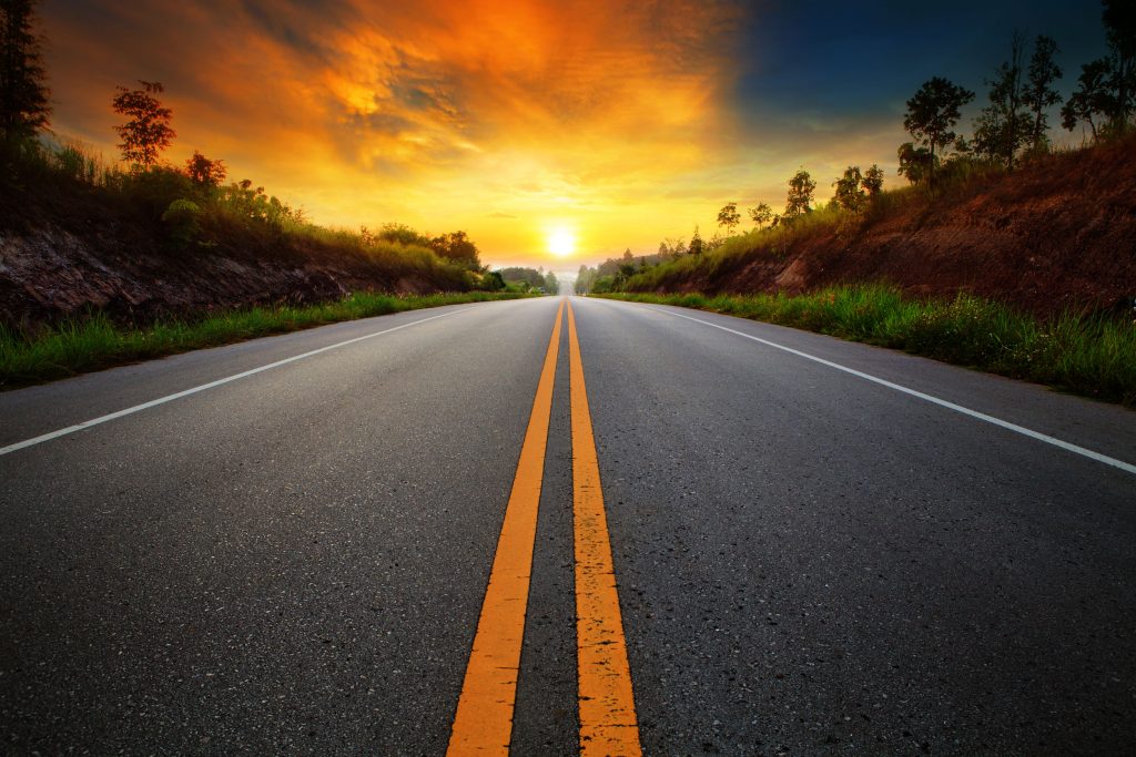 beautiful sun rising sky with asphalt highways road in rural scene use land transport and traveling background,backdrop